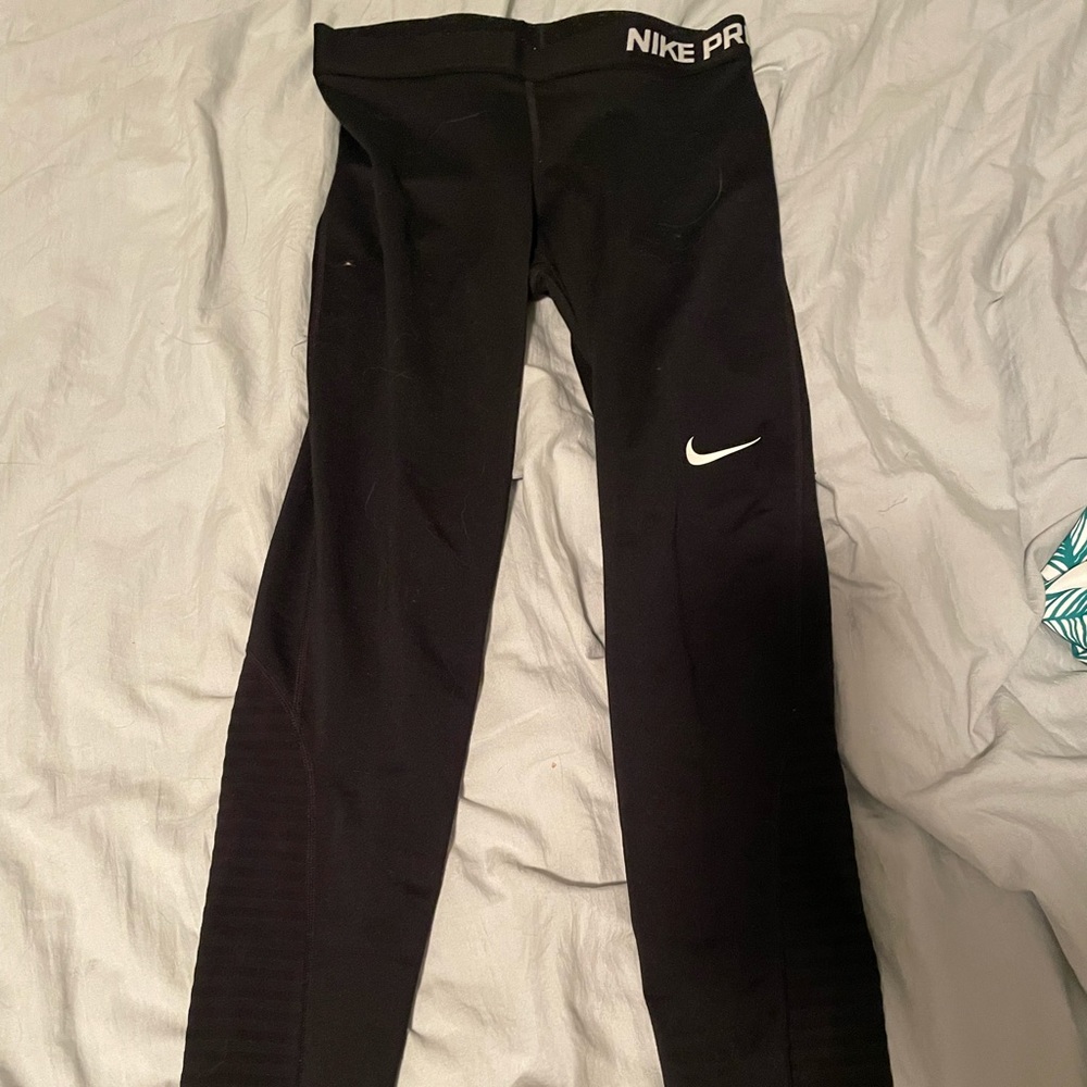 nike pro leggings black with mesh details.